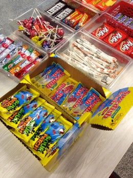 Candy is always a huge seller at school concession stands. Concession Stand Organization Ideas, Easy Food To Sell, Food To Sell At School, Concession Stand Organization, Snacks To Sell At School, Concession Stand Ideas Diy, Football Concession Stand, Snacks To Sell, Food To Sell