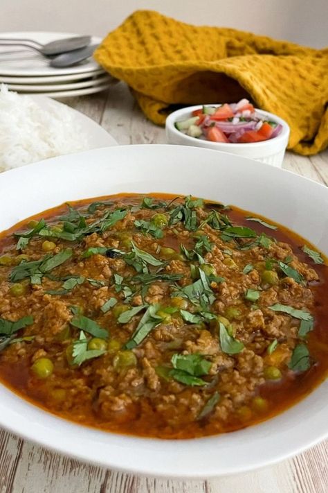 If you’re looking for a quick and easy weeknight Pakistani curry recipe, you’ll love this keema matar recipe. This Keema Matar recipe is a simple Pakistani curry made with ground beef and fresh or frozen green peas simmered in a flavorful sauce! Serve this easy keema matar curry with steamed rice or roti or bread for an easy weeknight meal! Pakistani Dinner, Beef Keema, Easy Dinner For Two, Easy Weeknight Dinner Ideas, Pakistani Cuisine, Easy Dinners For Two, Weeknight Dinner Ideas, What To Make For Dinner, Desi Food