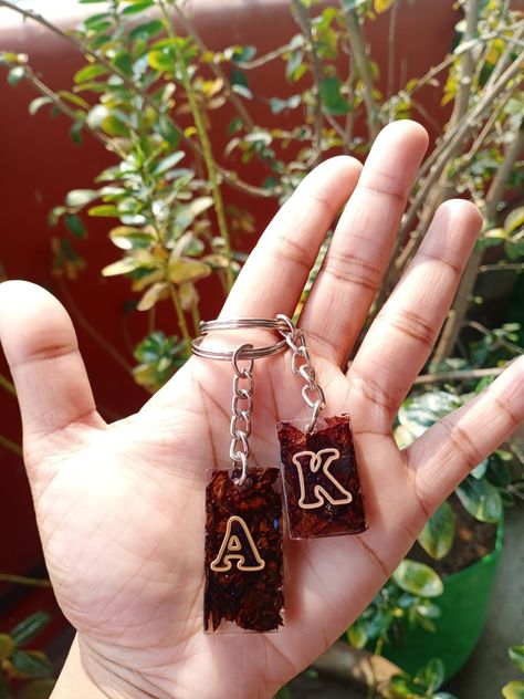 This is a resin keychain with rose preserved in it and initials "A" and "K" on it. This links directs to my small business page where you can place an order in DM to preserve your precious flower with us. Rose Preserved In Resin, Rose Preservation, Rose Keychain, Resin Rose, Resin Keychain, Business Page, Business Pages, Artistry Makeup, Photo Poses