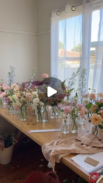 courtney | floral designer on Instagram: "bud vases ✨ #weddingflorals #budvases" Assorted Bud Vases Wedding, Bud Vases With Candles, Bud Vases Long Table, Pastel Bud Vases Wedding, Pastel Bud Vase Centerpiece, Bud Vases Round Table Wedding, Wildflower Bud Vases, Bud Vases Colorful Flowers, Bud Vases Wedding Centerpiece