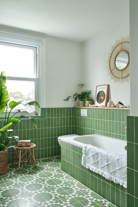 Our vast range of green toned tiles offers opportunity to experiment with different designs and patterns. Transform your floors and walls by browsing our range of green tiles. Image via @astridtemplier @lostandfoundinteriors Colourful Tiled Bathrooms, Tiled Bath Panel Ideas, Tiled In Bath, Green Tiles In Bathroom, Colourful Bathroom Tiles, Light Green Tile Bathroom, Green Bathroom Floor, Tiled Bath Panel, Tiled Baths