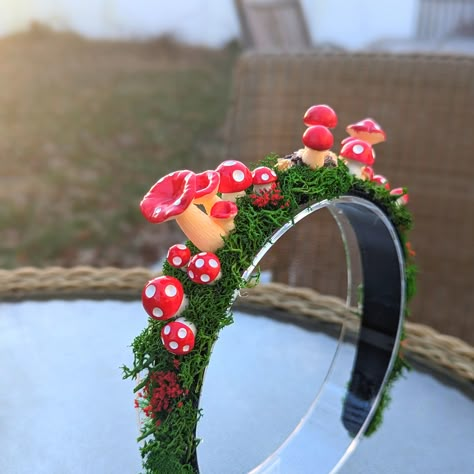 Escape reality with this gorgeous Red Mushroom Headband that will take any outfit to the next level. It has a delicate look perfect for a cottage core cutie baking a pie or gardening with their gnomes. Frolick with this headband at a Renaissance Faire, don it as a Fairy Crown, and enjoy it as the beautiful rainbow mushroom headband it is. Wear this as a festival headpiece or part of a costume headpiece. Ren Faire Costume Mushroom, Mushroom Crown Diy, Mushroom Flower Crown, Mushroom Core Aesthetic Outfits, Mushroom Ren Faire, Mushroom Rave Outfit, Mushroom Fairy Costume, Cottage Core Birthday, Mushroom Headband