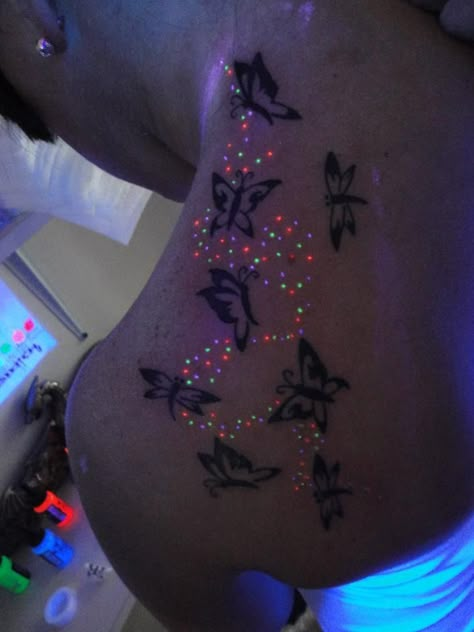 UV butterfly tattoo on shoulder - mariposa trails under black light Blacklight Tattoo, Tattoo Glow In The Dark, Glow In The Dark Tattoo, Light Tattoos, Butterflies Tattoos, Butterfly Tats, Uv Tattoos, Black Light Tattoo, Tattoo Son