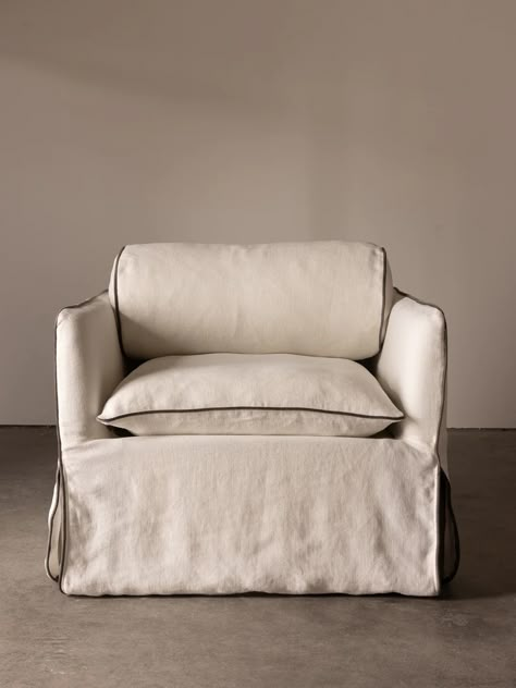 Limited stock available for March 2024 Delivery  Feather-filled and fabricated in 100% European linen, The Cohen Armchair is a luxurious place of residence, in which to restore and unwind. With its plush curved-back pillow, channel stitching and contrast velvet piping, comfort and style are married with the practicalit Apartment Boston, Patina Furniture, Vanity Fixtures, Hamptons Furniture, Stainless Steel Coffee Table, Uk House, Warm Minimalism, Field House, North Sydney