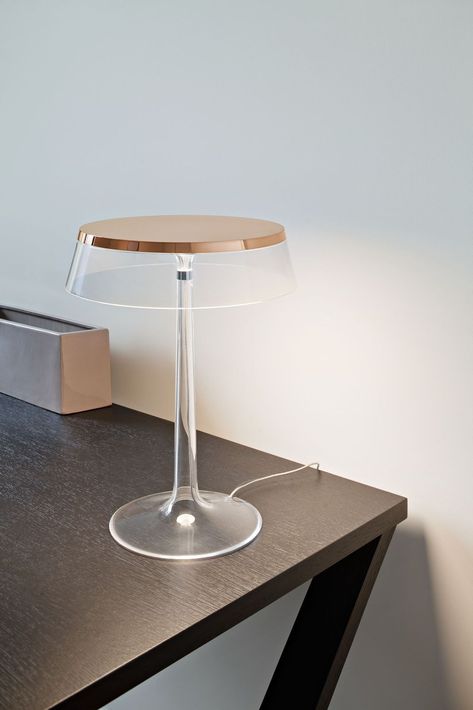 Designed by Philippe Starck, Bon Jour gives users the ability to effortlessly control the intensity of the direct light with just one click. This contemporary table lamp seamlessly blends into any home office and deskspace to offer the ideal amount of light. #flos #floslighting #design #lightingdesign #italiandesign #interiorinspiration #italianlighting #interiordesign #tablelamp #modernlamp #contemporarylighting #lightingideas #homedecor #workfromhome #homeoffice #homeofficeideas Dining Room Table Lamps, Product Lighting, Hotel Lighting, Track Lighting Fixtures, Table Top Lamps, Creative Tables, Lamp Art, Design Lamp, Table Lights