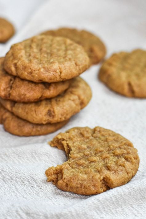 A pile of peanut butter miso cookies on top of a tan linen towel. A sprinkle of brown sugar is surrounding them. One of the cookies has a single bite of it. Miso Cookies, Miso Paste, Cookies Vegan, Vegan Peanut Butter, Silicone Baking Mat, Baking Mat, Cookie Scoop, Vegan Condiments, Vegan Sweets