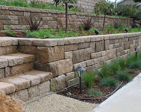 51 Really Cool Retaining Wall Ideas | Sebring Design Build | Design Trends Driveway Retaining Wall Ideas, Inexpensive Retaining Wall Ideas, Driveway Retaining Wall, Basalt Wall, Railroad Tie Retaining Wall, Retaining Wall Garden, Retaining Wall Steps, Backyard Retaining Walls, Retaining Wall Ideas