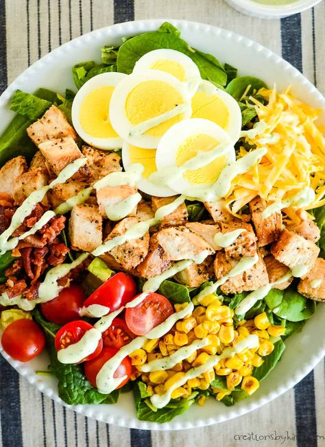 Love Chick-fil-A's Chicken Cobb Salad? Learn how to make your own version at home with this simple copycat recipe. It's the perfect way to satisfy your cravings! #chickencobbsalad #copycatrecipe #cobbsalad @Creations by Kara Restaurant Meals At Home, Chicken Salad Chick Pasta Salad Recipe, Chik Fil A Cobb Salad, Chickfila Copycat Recipes, Cobb Salad Chick Fil A, Chick Fil A Cobb Salad Recipe, Factor Meal Recipes Copycat, Chick Fil A Cobb Salad, Turkey Cobb Salad