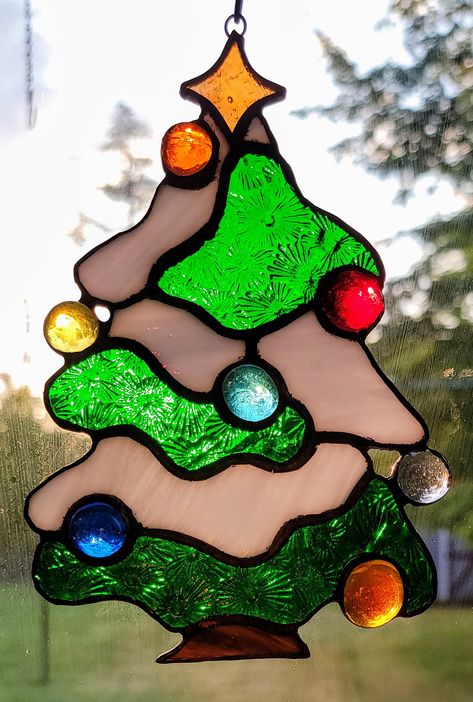 ALL PHOTOS ARE OF SAME PIECE - SAME PIECE YOU WILL RECEIVE Christmas Tree Stained Glass Suncatcher 17 piece Stained Glass Suncatcher Handmade with premium art glass - including Dichroic & Iridescent glass  approximately 4.5" x 6" Custom Request Welcome Christmas Tree Stained Glass Patterns, Stained Glass Patterns Christmas, Stained Glass Ornaments Christmas, Christmas Stained Glass Ideas, Stained Glass Christmas Patterns, Stained Glass Winter, Christmas Suncatchers, Stained Glass Cabinets, Tree Stained Glass