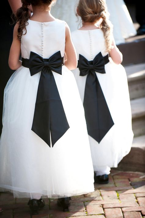 black bow white flower girl dresses Dresses With Bow, Black Flower Girl Dress, Black And White Wedding Theme, White Wedding Theme, White Flower Girl Dresses, Trendy Wedding Dresses, Black White Wedding, White Wedding Flowers, Black Tie Wedding