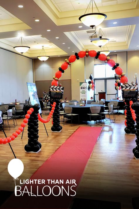 Balloon stanchions with linky balloon garland in between, leading to a linky balloon arch for a Hollywood party. Red Carpet Balloon Arch, Hollywood Balloon Arch, Career Planner, Sweet Sixteen Parties, Hollywood Party, Oscar Party, Balloon Sculptures, Red Balloon, Balloon Columns