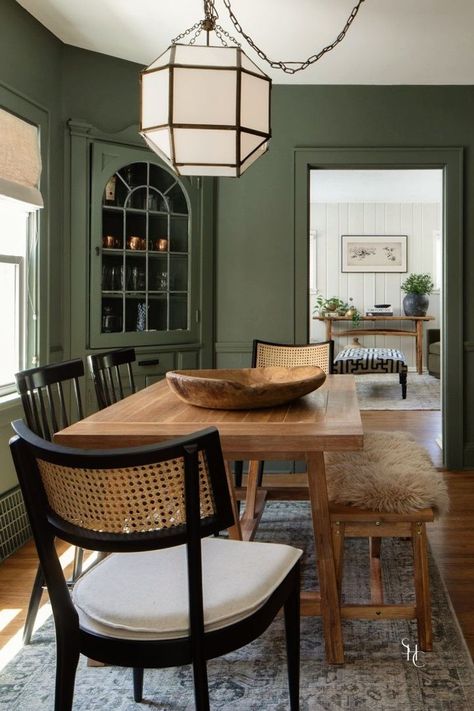 Searching for dark or olive green dining room ideas? Check out this dark green dining room walls featured in our Franklin Refresh design featuring wooden table and black chairs. See more at www.stonehousecollective.com Green Dining Room Walls, Room Ideas Dark, Moody Dining Room, Dark Dining Room, Olive Green Walls, Green Dining Room, Dark Green Walls, Dining Room Paint, Casual Dining Rooms