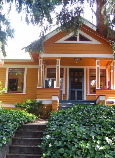 Lighter orange exterior, white/cream trim,  blue door and porch, red/dark orange details Creative Exterior House Painting Ideas, 1970s House Exterior, Bright House, Seattle Homes, Farm Houses, Yellow House, Exterior Paint Color, Orange House, Casa Exterior