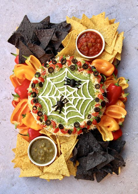 Spider Web Seven Layer Dip by The BakerMama Summerween Party Food Ideas, Summer Halloween Party, Dip Board, Plat Halloween, Recetas Halloween, Bolo Halloween, Halloween Party Appetizers, Seven Layer Dip, Halloween Food Appetizers