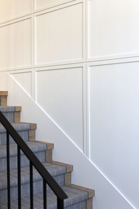 Front Entrance Wainscoting, Stairwell Millwork, Board And Batten Pattern Ideas, Board And Batten Tall Ceilings, Board And Batten Wall Stairways, Staircase Wall Paneling, Stairwell Molding, Stairway Wall Design, Shiplap Staircase Wall