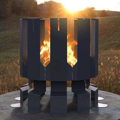 Inspired by the rigid geometry of Roman architecture, this stunning fire pit is forged from 100% heavy gauge steel and features slits in the rising columns for resting a rotisserie spit, skewers, or even marshmallow roasting sticks. Outdoor Cottage, Contemporary Fire Pit, Fire Pit Lighting, Wood Fire Pit, Fire Pit Furniture, Burning Fire, Wood Burning Fire Pit, Roman Architecture, Fire Pit Designs