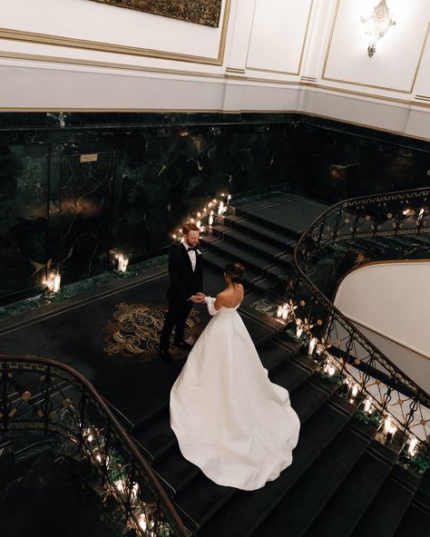 A Midnight Kiss at a Boston New Year’s Eve Wedding✨ Alie and Zach’s winter wedding theme of elegant, moody, classic glam was beautifully brought to life by @bameventsbos. The sophisticated color palette, enriched with gold accents and abundant candlelight, perfectly matched their vision. The photos by @cityluxstudios not only captured the couple’s happiness and the venue’s grandeur but also added a timeless elegance with black-and-white images that embodied the glam of their New Year’s Eve c... Classic Black White And Gold Wedding, Winter Wedding Classy, Winter Wedding Black Tie, Old Money Wedding Color Palette, New Year’s Eve Wedding, New Years Eve Wedding Ideas, Black White Gold Wedding Theme, Winter Wedding Aesthetic, Sophisticated Color Palette