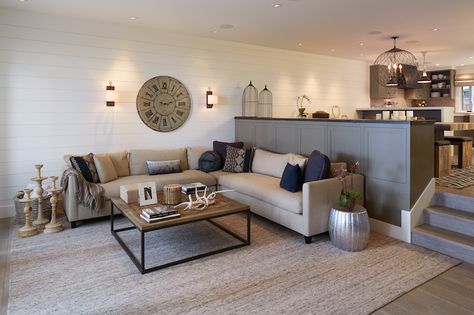 Gorgeous sunken living room with shiplap paneled walls and gray washed hardwood floors layered with a braided sisal rug. Industrial Style Home, Sunken Living Room, House Tips, Furniture Placement, Trendy Living Rooms, Living Room Remodel, Family Room Design, Room Remodeling, Traditional Interior