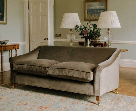 Tactile velvet sofas bring a touch of luxury to living rooms and make a statement focal point. We look at 10 of our favourite velvet sofas for this season. Antique Sofa Living Room, Taupe Sofa Living Room, Traditional Country Home, Colonial Interior Design, Taupe Sofa, Velvet Sofa Living Room, Velvet Sofas, Grey Couch Living Room, Sofa Handmade