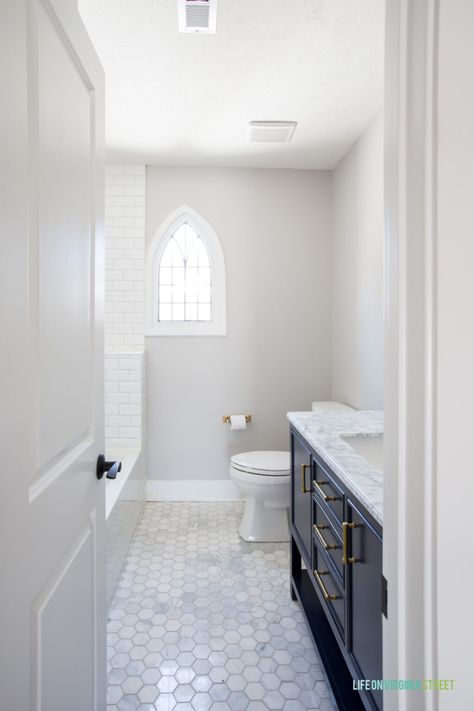 The Tudor House Renovation Reveal - Life On Virginia Street Beige Bathroom Floor Ideas, Cambria Montgomery Quartz Bathroom, Tile Behind Toilet, Galley Bathroom Ideas, Bathroom Tile Floor Ideas, Updated Tudor, Bathroom Timeless, Before And After Home, Bathroom 2024