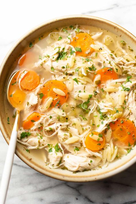 This Crockpot lemon chicken orzo soup recipe is really easy to throw together and comforting. It has juicy chicken, hearty vegetables, and pasta in a bright lemony broth! Vegetable Beef Soup Instant Pot, Beef Soup Instant Pot, Crockpot Chicken Soup Recipes, Crockpot Lemon Chicken, Instant Pot Vegetable Beef Soup, Lemon Orzo Soup, Postpartum Recipes, Chicken Soup Crockpot, Lemon Chicken Orzo