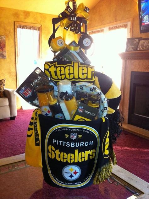 Made for our car club fundraiser all proceeds went to Westmoreland children's Bureau... Go Steelers! Made by Kimberly Pittsburgh Themed Party, Steelers Wreath Diy, Basket Boyfriend, Steelers Birthday, Steelers Party, Football Gift Baskets, Steelers Decor, Steelers Wreath, Popcorn Gift Basket