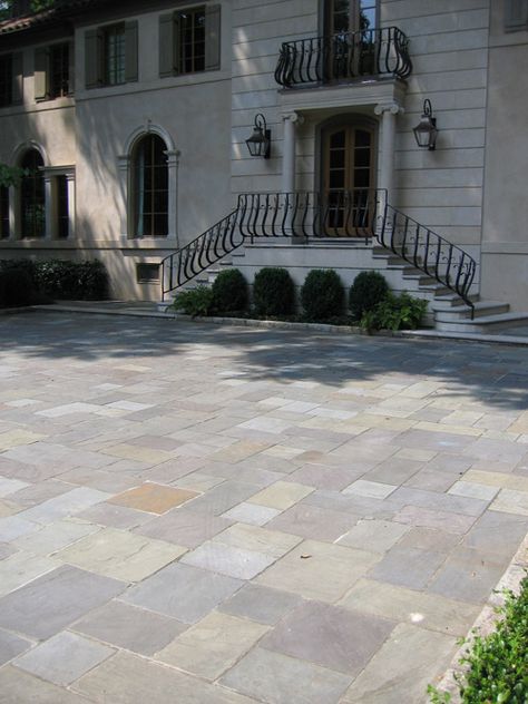 A formal bluestone motor court in a random ashlar pattern and granite cobblestone edging. In the background, is the main entrance with french doors, above & below and a small balcony. Ashlar Pattern, Front Steps, Front Entrances, Small Balcony, Main Entrance, House Front, Front Garden, Estate Homes, French Doors