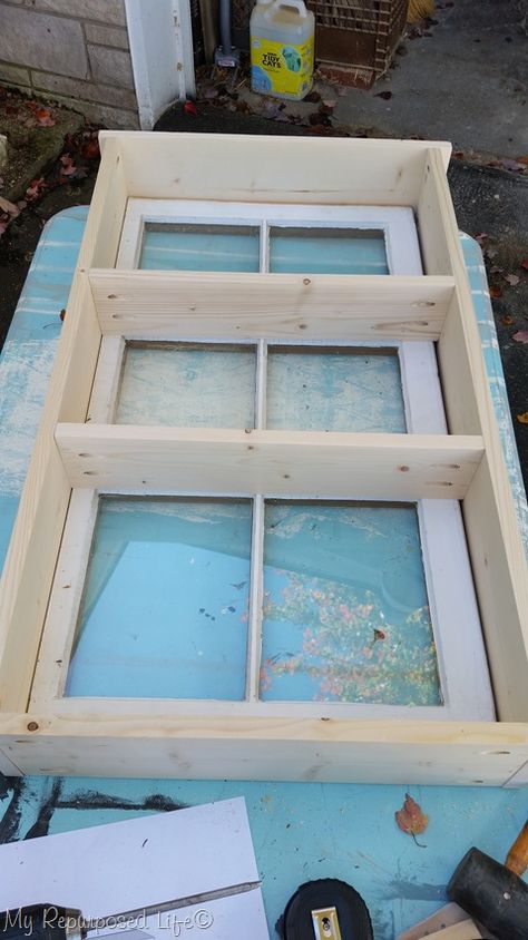 how to add shelves to a window cupboard Window Frame Shelves, Recycled Windows Ideas, Shelves Inside Window Frame, Old Window Shelves, Old Window Shelf Diy, Wall Window Design, Cabinets Made From Old Windows, Old Wooden Windows Projects Ideas, Vintage Windows Repurposed