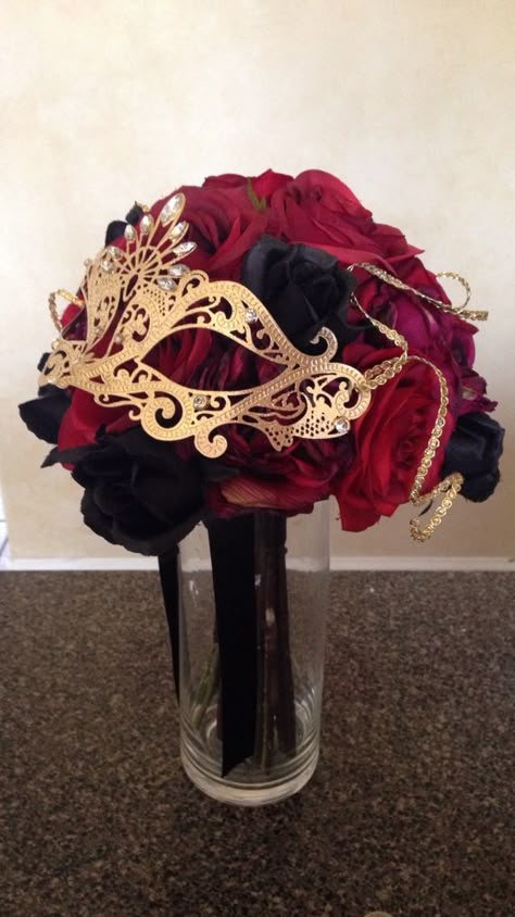 Red and black rose bridal bouquet, for a red, black and gold masquerade wedding reception! Sweet 16 Masquerade Party, Masquerade Centerpieces, Mascarade Party, Masquerade Decorations, Masquerade Party Decorations, Masquerade Prom, Red Bridal Bouquet, Masquerade Ball Party, Masquerade Theme