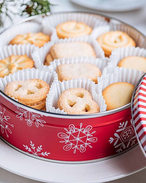 This Easy Cookie Tin Hack Makes the Best Holiday Dessert | The Kitchn Cookie Tin Cake Recipe, Cookie Tin Cake, Cookie Tin Recipes, Easiest Dessert, Christmas Cookie Tin Recipes, Christmas Tin Cookies, Reuse Cookie Tins, Tin Cookie Container Ideas, Christmas Cookie Tin Ideas