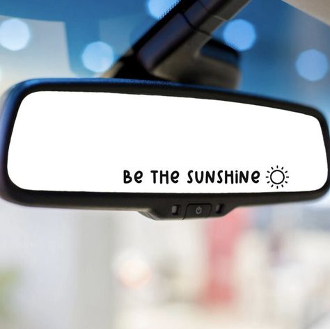 Bring cheer and sunshine to wherever you put this stylish vinyl mirror decal! Featuring the playful phrase 'Be the Sunshine', this decal will add a special touch of positivity and it's sure to brighten up the atmosphere and keep your mood just as sunny!

✦ Waterproof, Permanent vinyl 

✦ 3.5 inches long

4 colors available 
✦ black
✦ white
✦ pink/orange holographic 
✦ silver/blue holographic Rear View Mirror Stickers, Mirror Messages, Affirmation Mirror, Vinyl Mirror, Surfer Stickers, Car Mirror Decals, Mirror Vinyl, Mirror Decals, Be The Sunshine