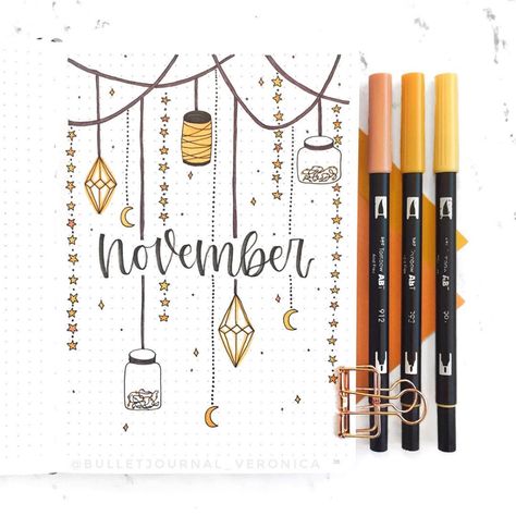 Veronica ♡ on Instagram: “November cover page! ✨ My theme this month is hanging lights / lanterns, but I also added in some star and moon doodles! I’m really excited…” November Cover Page, November Bullet Journal, Bulletin Journal, Bullet Journal Month, Bullet Journal Set Up, Bullet Journal Cover Page, Bullet Journal Cover Ideas, Journal Bullet, Bullet Planner