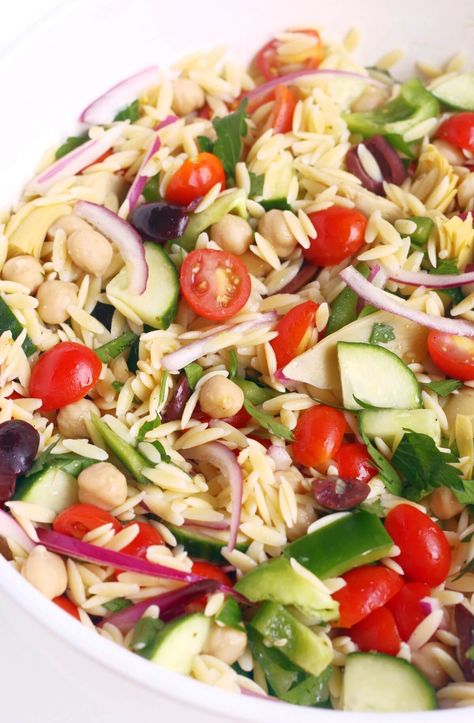 Orzo Pasta Salad (Gluten-Free, Vegan) | Strength and Sunshine | This cold Orzo Pasta Salad recipe is gluten-free, vegan, and allergy-free! This Greek-inspired orzo pasta salad is packed with fresh crisp veggies, kalamata olives, artichokes, chickpeas, and tender orzo, tossed with simple homemade vinaigrette! A healthy Mediterranean side dish that's easy and quick to whip up for potlucks, cookouts, and light meal prep lunches for the week! Light Meal Prep, Cold Orzo Pasta Salad, Vegan Pasta Salads, Orzo Recipes Healthy, Fluff Salads, Orzo Pasta Salad Recipe, Gluten Free Orzo, Lunches For The Week, Meal Prep Lunches