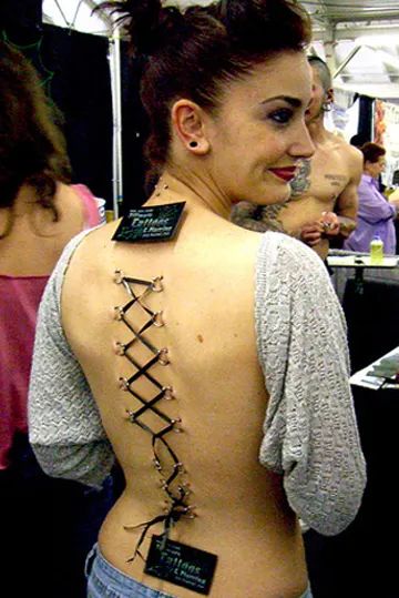 Crazy Piercings - HubPages Lyrics Tattoos, Body Peircings, Crazy Piercings, Are Tattoos, Back Piercings, Weird Tattoos, Amber Rose, Body Piercings, Tattoo Placement