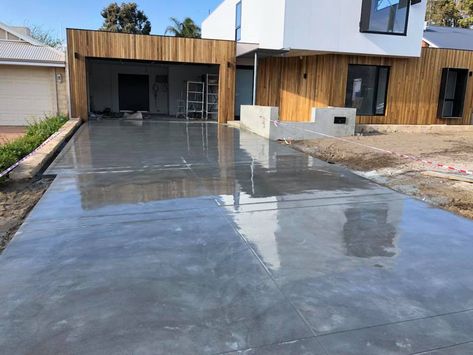 Burnished concrete driveway Long Concrete Driveway, Dark Concrete Driveway, Exposed Concrete Driveway, Concrete Imprint Driveways, Concrete Cobblestone Driveway, Concrete Driveways, Driveway, Architecture