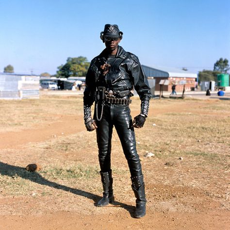 The Heavy Metal Subculture of Botswana, Africa | Messy Nessy Chic | "The heavy metal cowboy get-ups sported by Dennis Hopper in Easy Rider and Mel Gibson in Mad Max are probably considered more than a little passé in the world of men’s style, better left in the 1970s. But in Sub-Saharan Africa, the art of dressing like you’ve just stepped out of a Metallica concert is still very much alive..." Goth Cowboy, Metallica Concert, Leather Clothes, Black Cowboys, Olivia De Havilland, Metal Fan, Black Cowboy, Cowboy Outfits, Metal Fashion