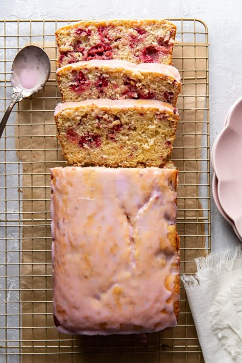 A tender raspberry lemon poppyseed loaf cake, bursting with raspberry and lemon flavor! This soft, delicious cake has a layer of lemon icing on top. The perfect thing to make for breakfast, brunch or even as a dessert. Raspberry And Lemon Loaf, Lemon Poppyseed Loaf Cake, Raspberry Lemon Pound Cake, Not Too Sweet Cake Recipes, Strawberry Lemon Loaf Cake, Thing To Make For Breakfast, Poppyseed Loaf Cake, Lemon Raspberry Loaf, Fruit Loaf Cake