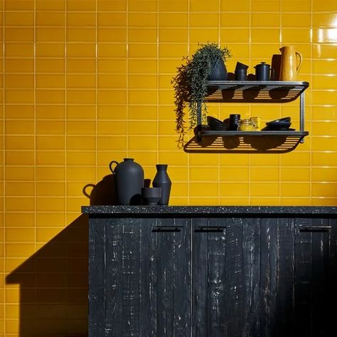 The Subway Brick Tile Trend | Topps Tiles Yellow Kitchen Tiles, Yellow Wall Tiles, Mustard Kitchen, Coloured Grout, Plant Kitchen, Topps Tiles, Yellow Tile, Stone Mosaic Tile, Tile Trends