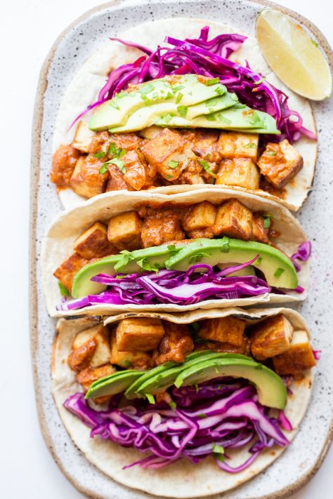 These Sriracha Tofu Tacos use Trader Joe's Baked Sriracha Tofu for a quick vegan meal! The tofu is quickly sautéed and piled onto corn tortillas with cabbage, avocado, and salsa for a deliciously filling high-protein plant-based dinner. Vegan Breakfast Tacos, Sriracha Tofu, Easy Vegan Breakfast, Salty Recipes, Foods For Abs, Tofu Tacos, Inflammatory Recipes, Quick Vegan, Quick Vegan Meals