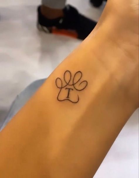 Dog Meaningful Tattoos, Small Paw Print Tattoo With Initial, Tattoo For Multiple Dogs, Shih Tzu Tattoo Minimalist, Pet Name Tattoo, Simple Dog Tattoos, Tatoo Dog, Tattoos Tiny, Small Dog Tattoos