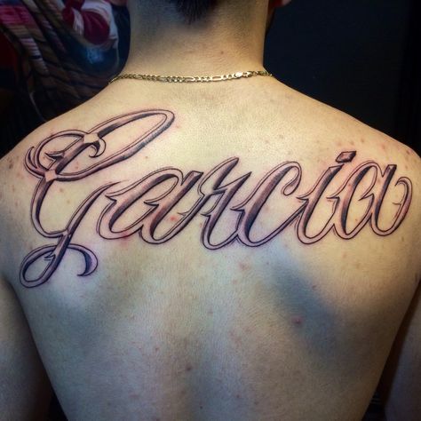 GARCIA Garcia Tattoo Last Name, Last Name Tattoos, Tattoo Calligraphy, Super Tattoo, Upper Back Tattoos, Tattoo Lettering Styles, Chicano Drawings, Tattoo Design Book, Name Letters