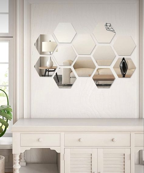 #home #decor #homedecor #decorations #furniture #candles #mirror #house #room #lights #plantbase #flowers #flowerpot #paintings #abstractart #walldecor #lamp #twirlylamp #hexagonmirrors #panelmirrors Small Mirrors On Wall Living Room, Hexagon Mirror Wall Decor Bedroom, Octagon Mirror Wall Decor, Hexagon Mirror Wall Decor Ideas, Hexagon Mirror Wall Decor Pattern, Mirror Wall Stickers Ideas, Mirror Sticker Wall Decor, Small Mirror Wall Decor Ideas, Modern Mirror Living Room