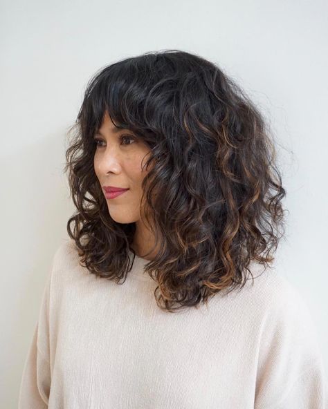 Whether you want trendy, blunt and polished, textured with bangs, an A-line shape, or feathered layers — we have your perfect lob for summer 2019. #haircutsforcurlyhair Long Bob With Bangs Curly Hair, Long Bob Haircut With Layers Curly Wavy Lob, Long Bob Haircut Curly Hair, Curly Long Bob Hairstyles Wavy Lob, A Line Curly Haircut, Wavy Long Bob With Bangs, Curly Lob Bangs, Curly Lob With Curtain Bangs, Long Curly Bob With Bangs