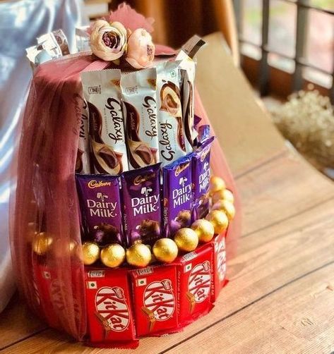 Chocolate tower Now just @880Rs/-❣️ Dm for orders🤍 @crafting_with_zana #chocolates#chocolatetower#decors#gifts#surprise#lovedone#spcldays#memories#love#happiness#handmadewithlove#offerprice#available#entreupreneur#crafter#passionate#success#enjoy#explore#reel#photography#loveyourself Chocolate Tower, Wedding Gifts Packaging, Flower Wallpapers, Cute Flower Wallpapers, Bridal Mehndi Designs, Bridal Mehndi, How To Make Chocolate, Gift Hampers, Flower Wallpaper