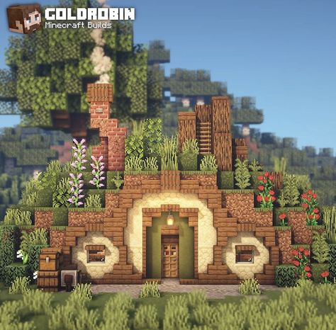 @xgoldrobin on instagram Small Hobbit House Minecraft, Hole In The Wall Minecraft House, Minecraft Smithy, Minecraft Hobbit Hole Entrance, Hobbit Home Minecraft, Bee Dome Minecraft, Goldrobin Minecraft, Minecraft Hobbit Hole, Chalet Minecraft