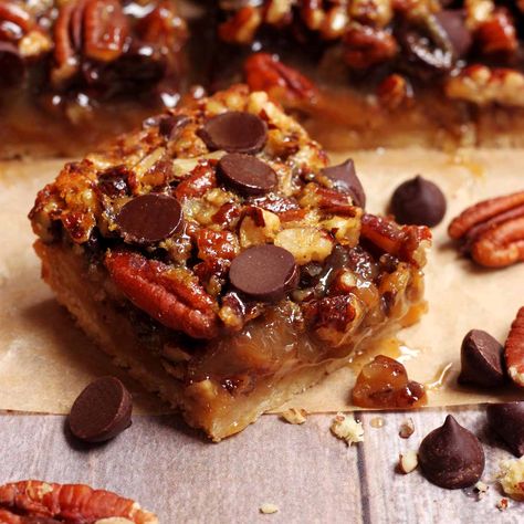 Chocolate Pecan Pie Bars Chocolate Pecan Pie Bars Recipe, Chocolate Chip Pecan Bars, Chocolate Pecan Bars Recipe, Chocolate Chip Pecan Pie Bars, Sliced Desserts, Gooey Bars Recipe, German Chocolate Pecan Pie Bars, December Desserts, Easy Pecan Pie Bars