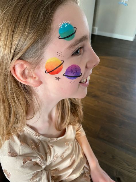 Space Themed Face Painting, Face Paint Ideas For Kids Easy, Planet Face Paint, Face Painting Ideas For Adults For Women, Astronaut Face Paint, Space Theme Face Paint, Children’s Face Paint, Face Paint Beginners, Kawaii Face Paint