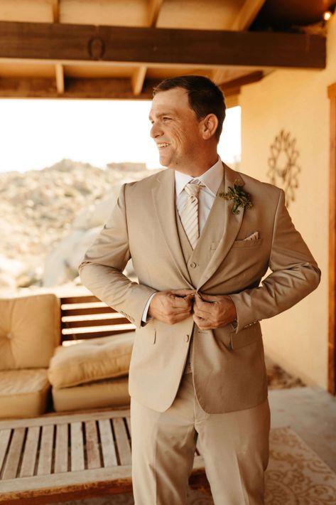 Groom in beige suit with succulent boutonniere before Joshua Tree Wedding. Click to see more of this boho wedding in California. #succulentboutonniere #elopement #bohowedding Beige Mens Suit, Beige Groom Suit, Beige Groom, Beige Suits For Men, Mens Suit For Wedding, Beige Suits Wedding, Succulent Boutonniere, Beige Suit, Suit Inspiration