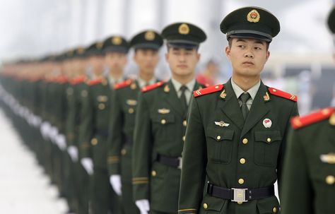 Police officers line up prior to the opening ceremony in the National Stadium at the Beijing 2008 Olympics on August 8, 2008. Crowd Art, Chinese Army, Chinese Military, Mind Blowing Images, People's Liberation Army, Martial Arts School, Large Crowd, Cathedral City, Cute Backgrounds For Phones