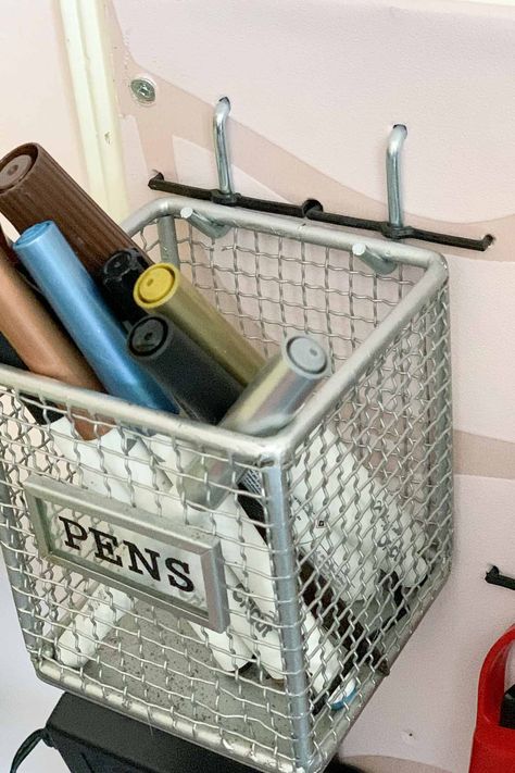 Pegboard Storage Hacks: 5 Ways To Make Cheap DIY Pegboard Baskets | Storage Ideas Diy Pegboard Basket, Hang Pegboard, Cricut Organization, Dream Workplace, Pegboard Baskets, Pegboard Craft Room, Pegboard Bins, Dice Making, Cricut Storage